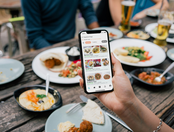 Catering business owner managing orders manually before automation